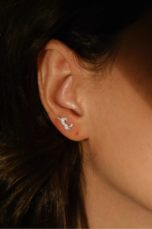 Galloping Horse AB Earrings — worn by a model
