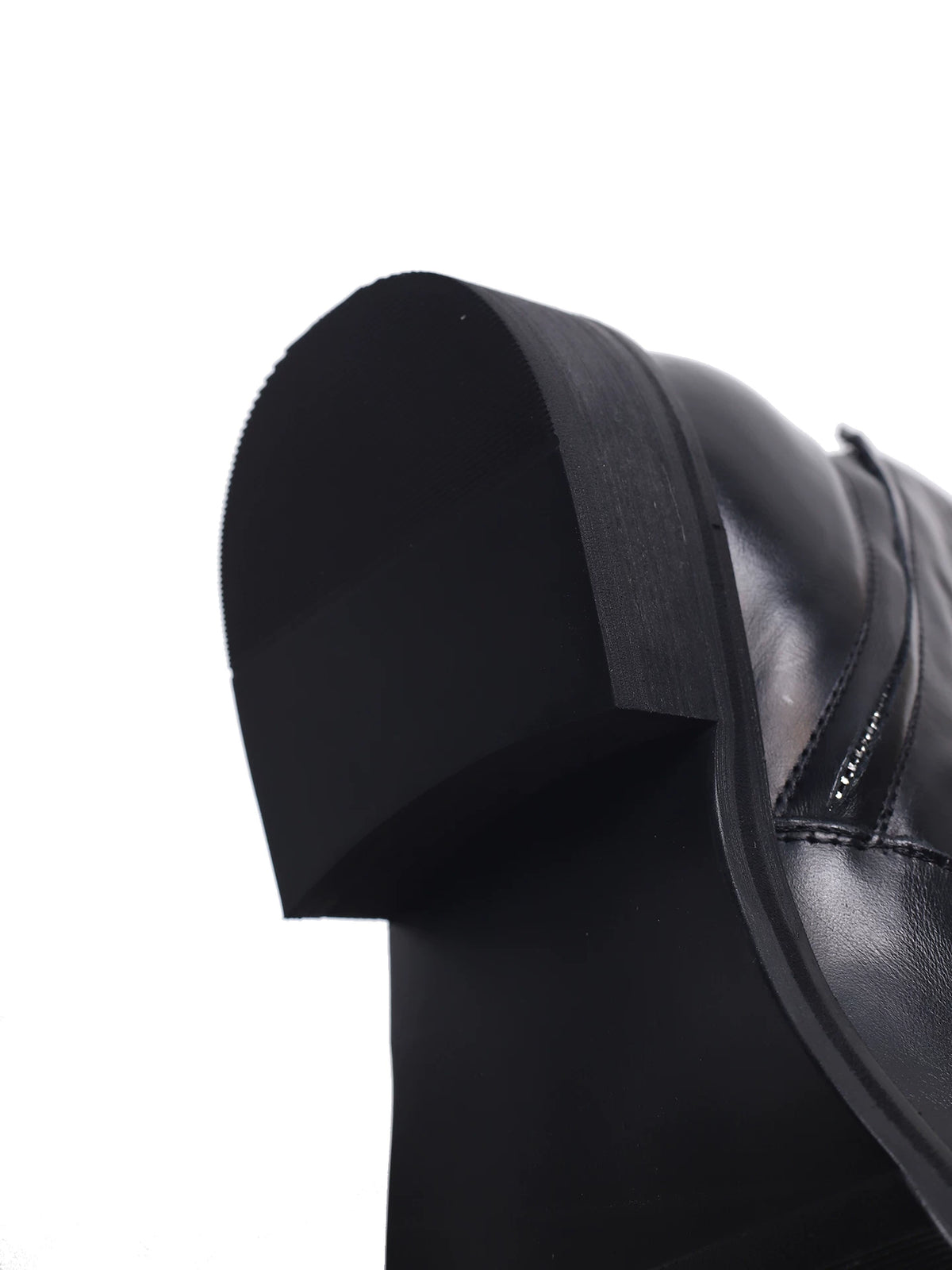 Black wrinkled leather ankle boots - outsole and heel detail