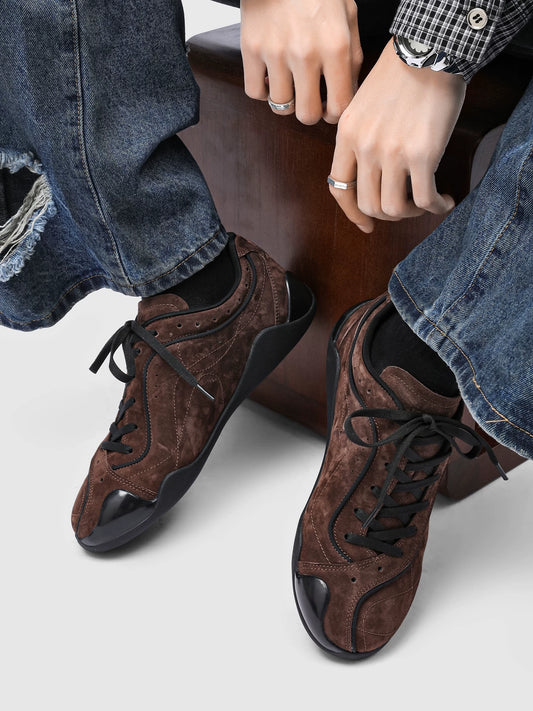 Brown faux suede low-top sneakers viewed from above