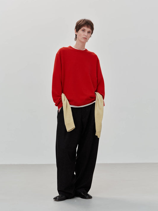 Wool cashmere crewneck sweater, model wearing red crewneck sweater