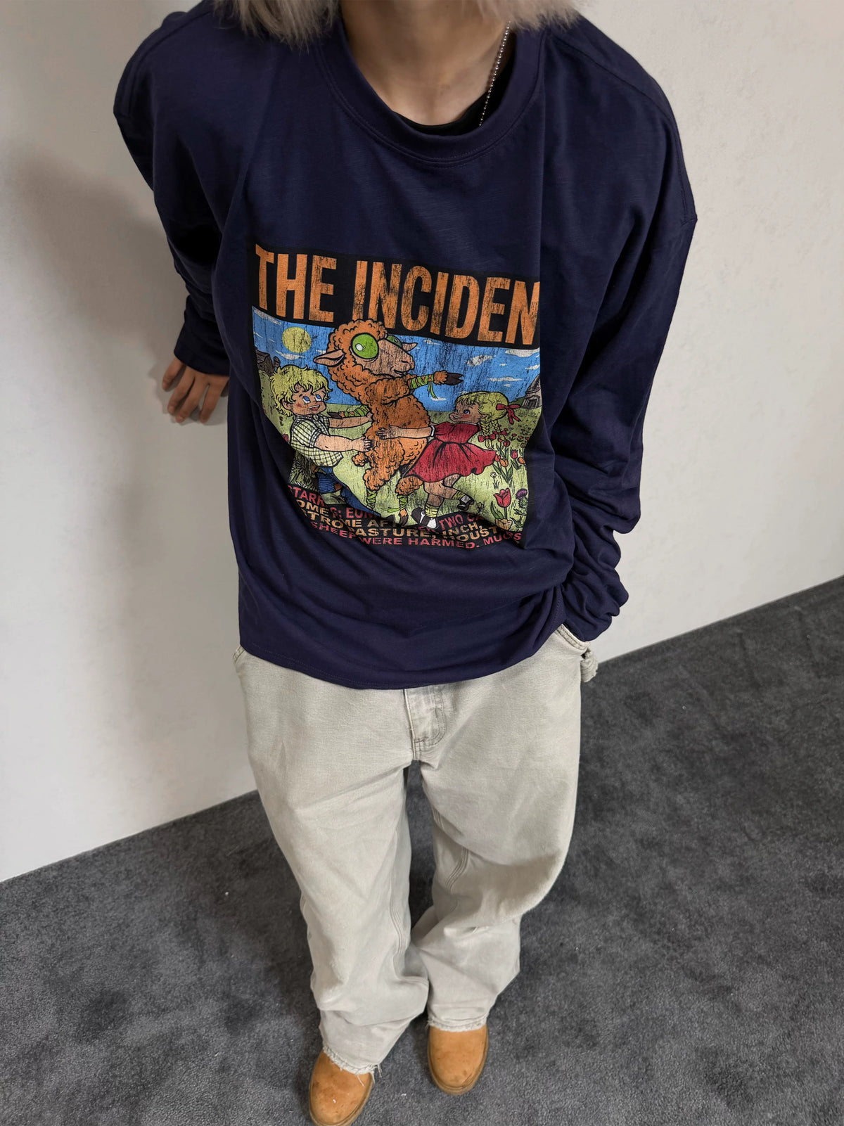 Vintage Graphic Long Sleeve T-Shirt, Model wearing blue purple version