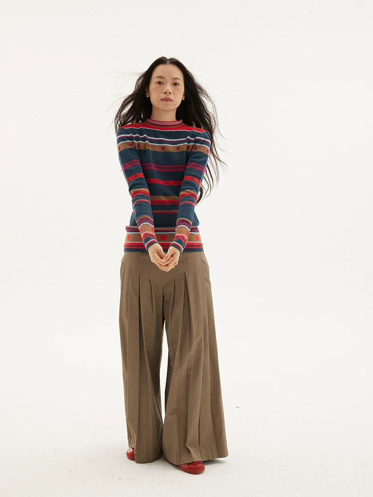 Striped knit sweater in navy, red and green, front view