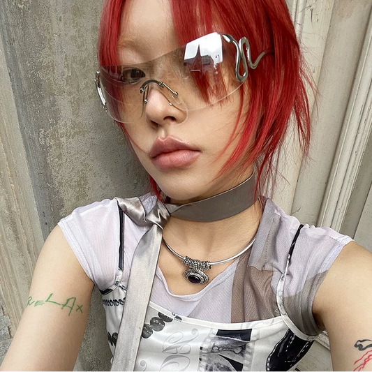 Serpentine Rimless Shield Sunglasses — Model wearing mirrored rimless shield sunglasses, selfie