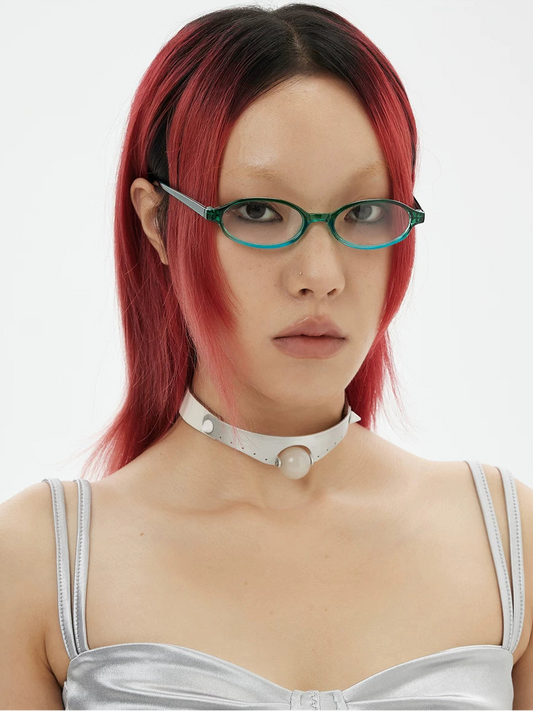 Two-Tone Oval Clear-Lens Glasses — Model wearing green two-tone oval clear-lens glasses