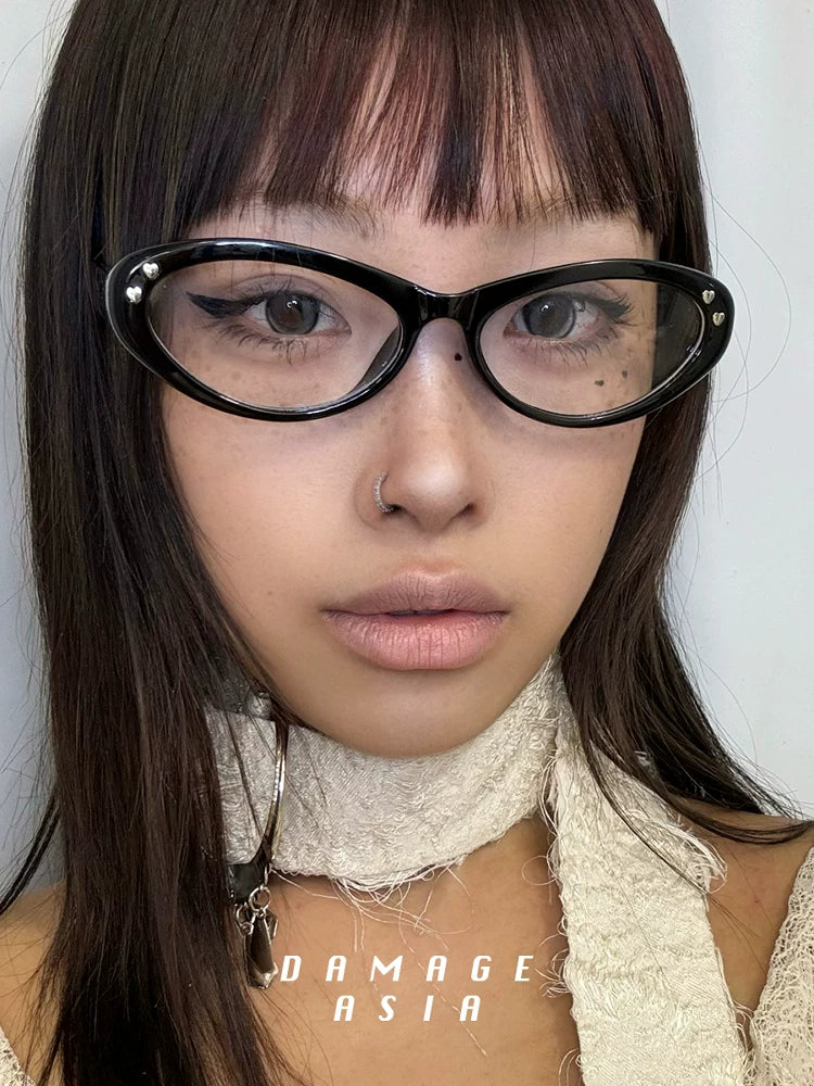 Upswept Cat-Eye Clear-Lens Glasses — Model wearing black clear-lens cat-eye glasses