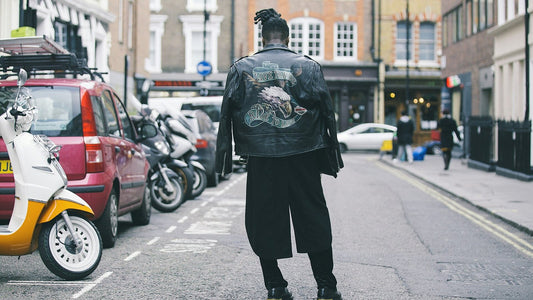Man wearing a black jacket on the street
