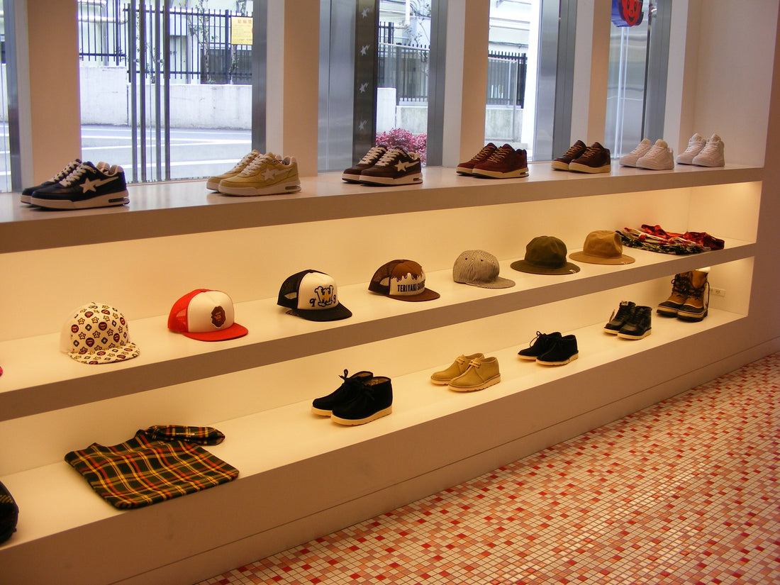 Interior of a BAPE store with apparel displays