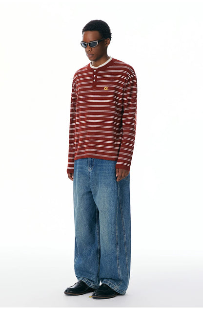 Side view of the red striped Henley sweater