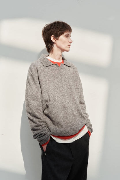 Grey boucle polo sweater, side view