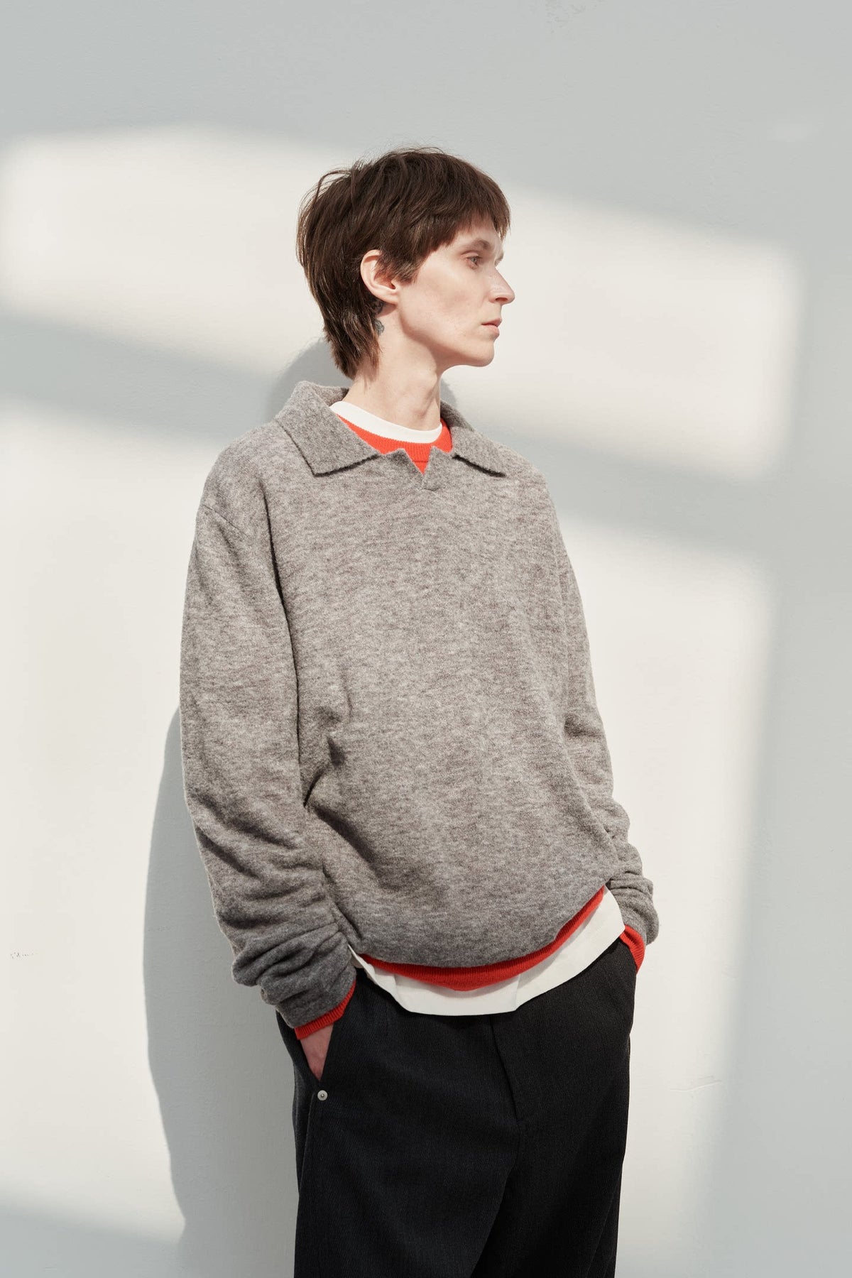 Grey boucle polo sweater, side view