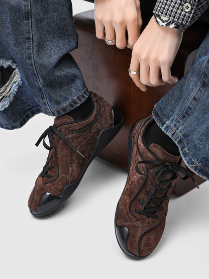Brown faux suede low-top sneakers viewed from above