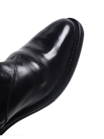 Black wrinkled leather ankle boots - toe and stitching detail