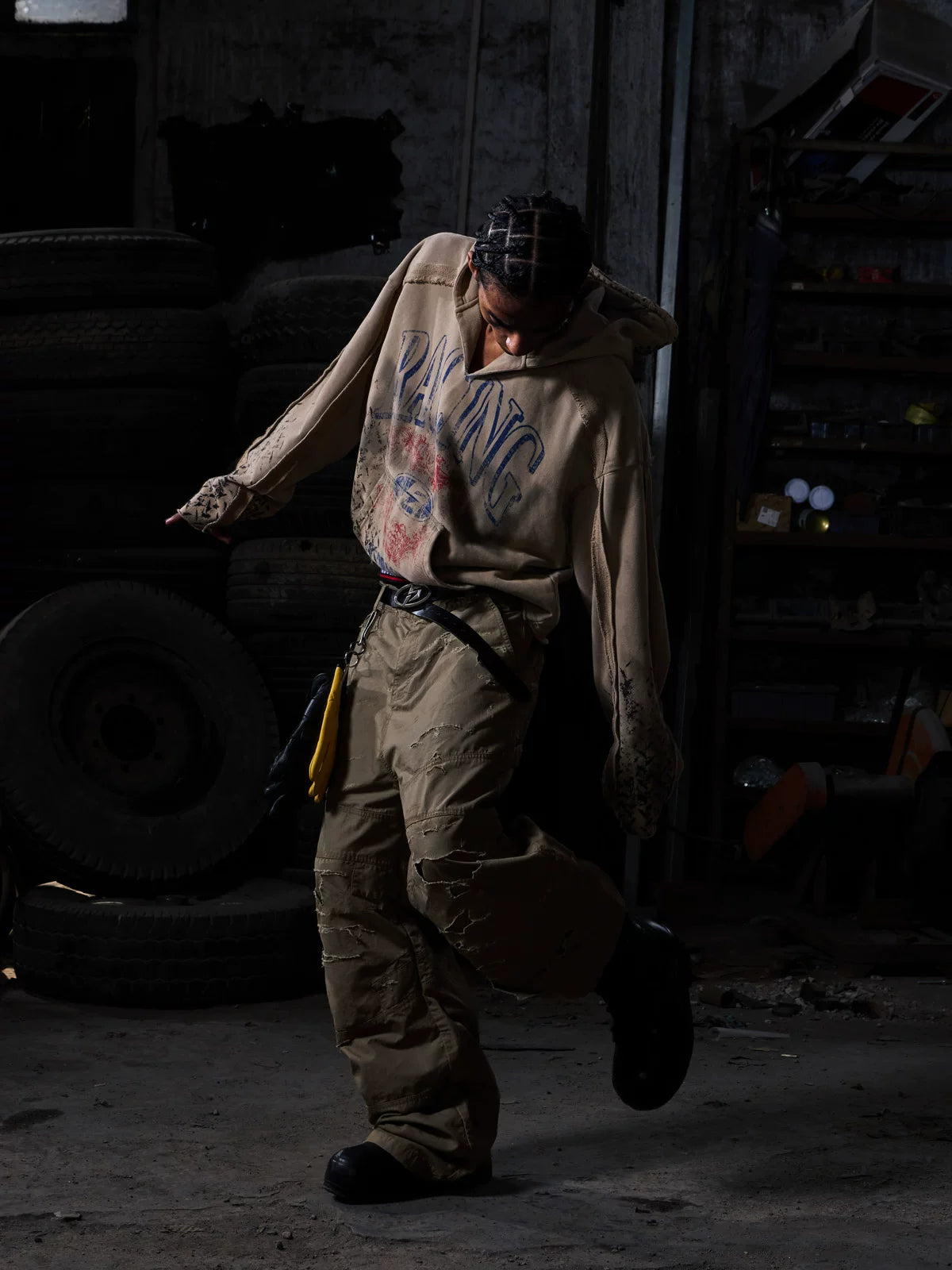 Khaki sweatshirt, side view in industrial setting
