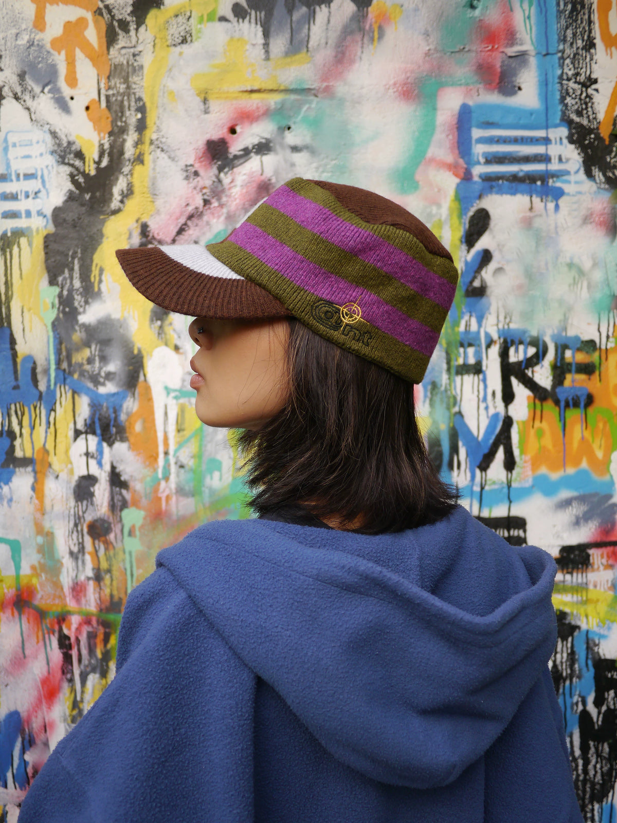 Embroidered Curved-Brim Knit Cap in Navy and Brown color