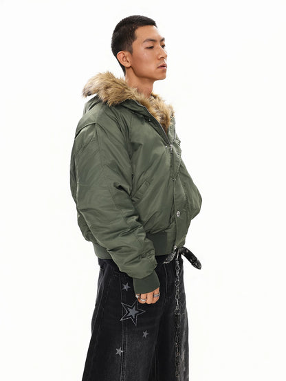 Olive green faux fur hood bomber jacket, side view on model