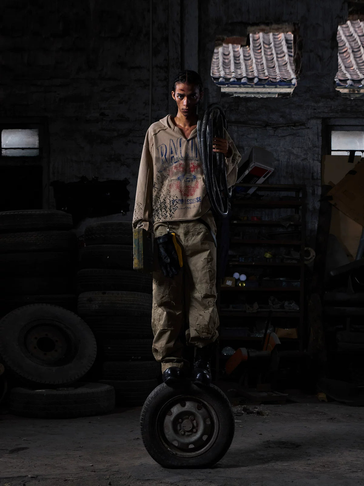 Khaki sweatshirt, front view in industrial setting