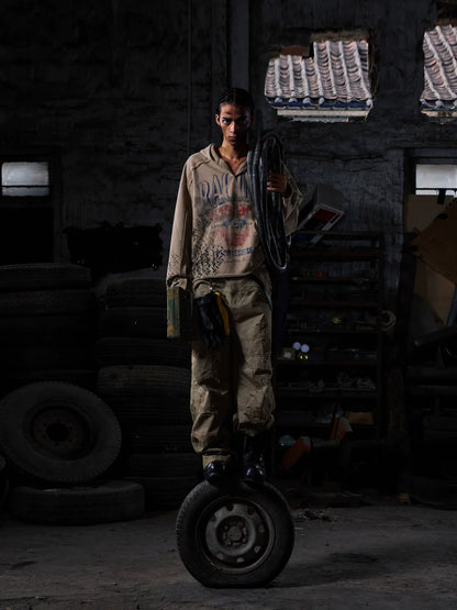 Khaki sweatshirt, front view in industrial setting