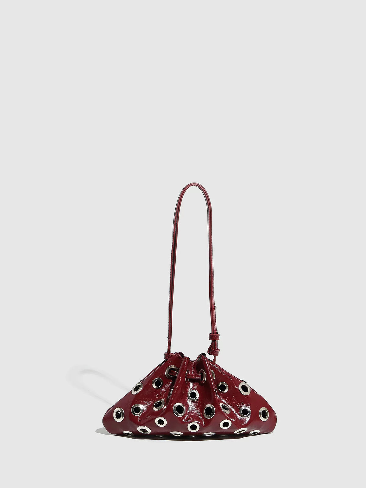 Eyelet Studded Drawstring Shoulder Bag product photo