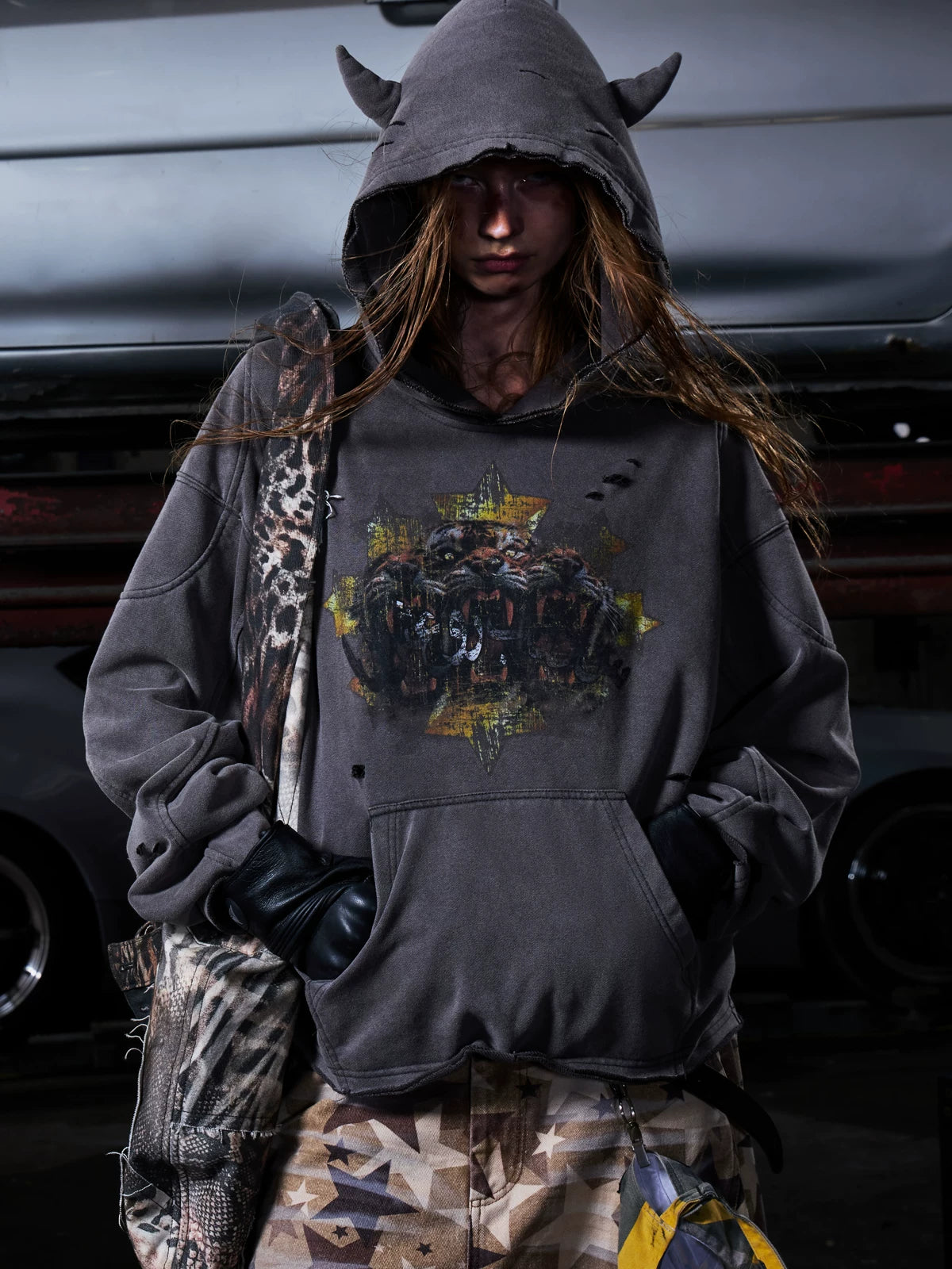 Grey hoodie chest graphic detail