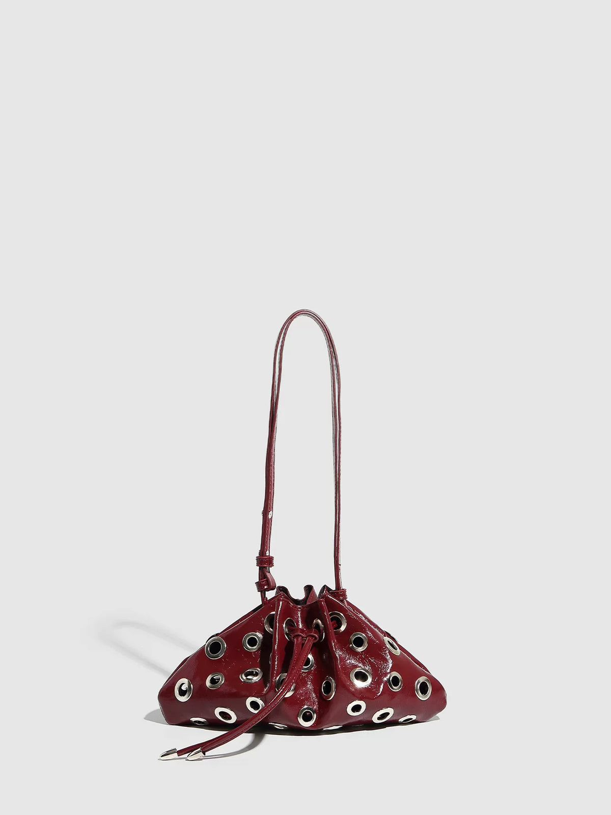 Eyelet Studded Drawstring Shoulder Bag product photo