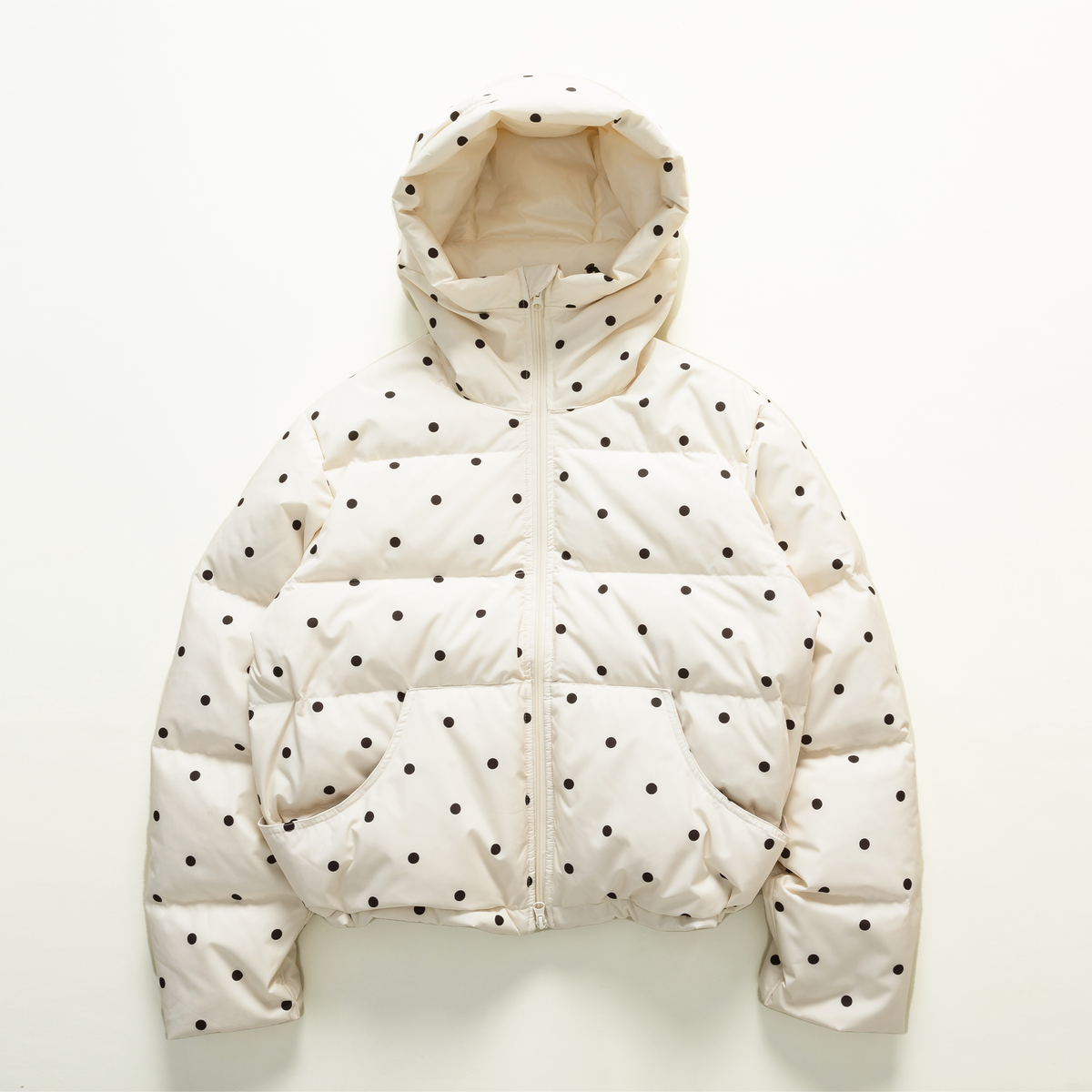 Cream dotted hooded puffer jacket, front view