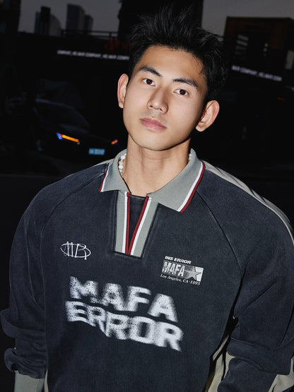 Charcoal pullover sweatshirt, chest print detail close-up on model