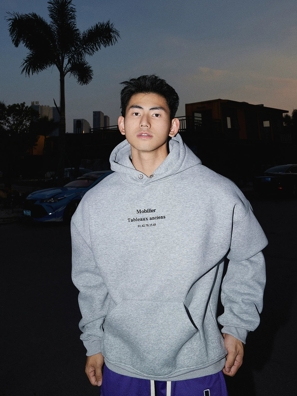 Grey hooded sweatshirt, front view