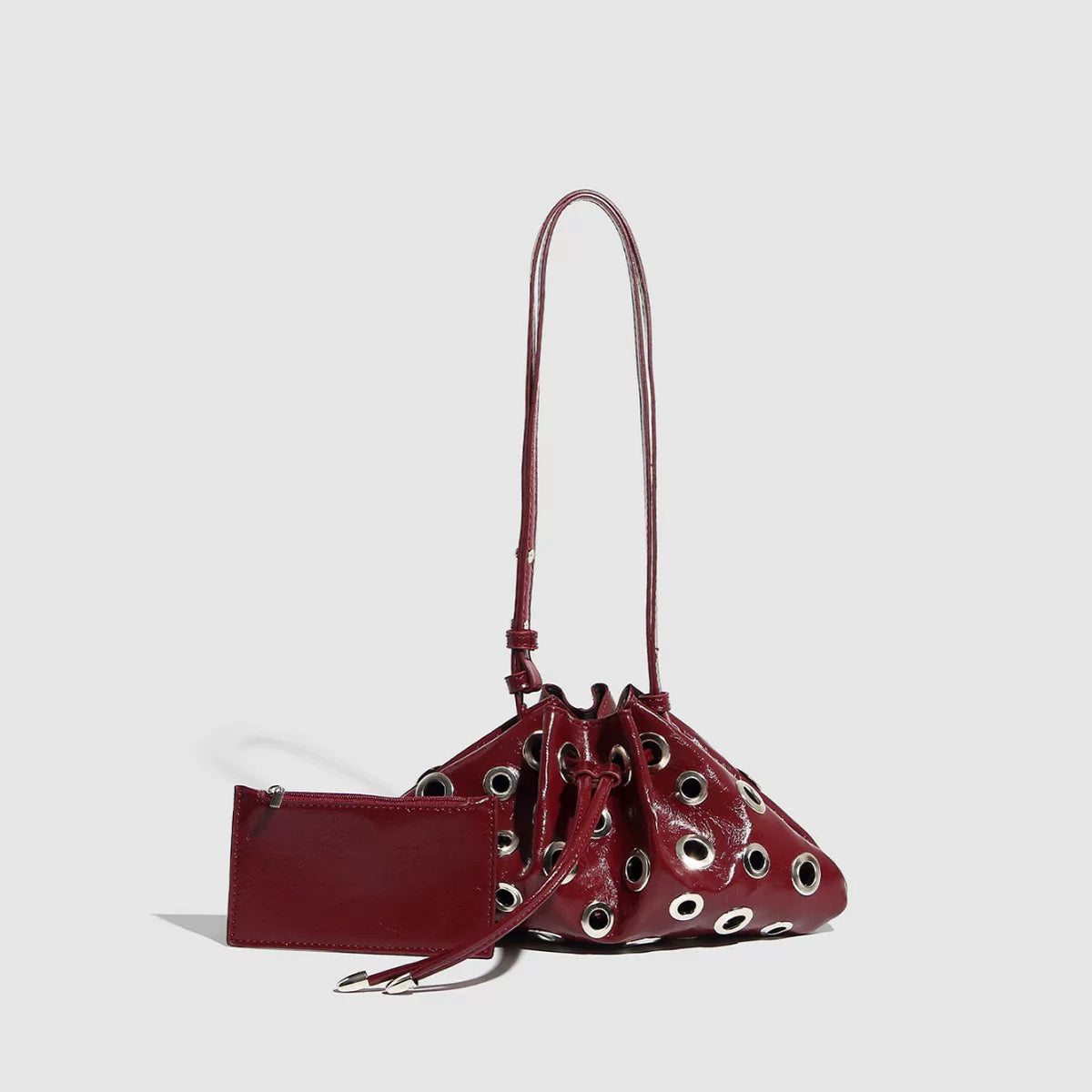 Eyelet Studded Drawstring Shoulder Bag product photo