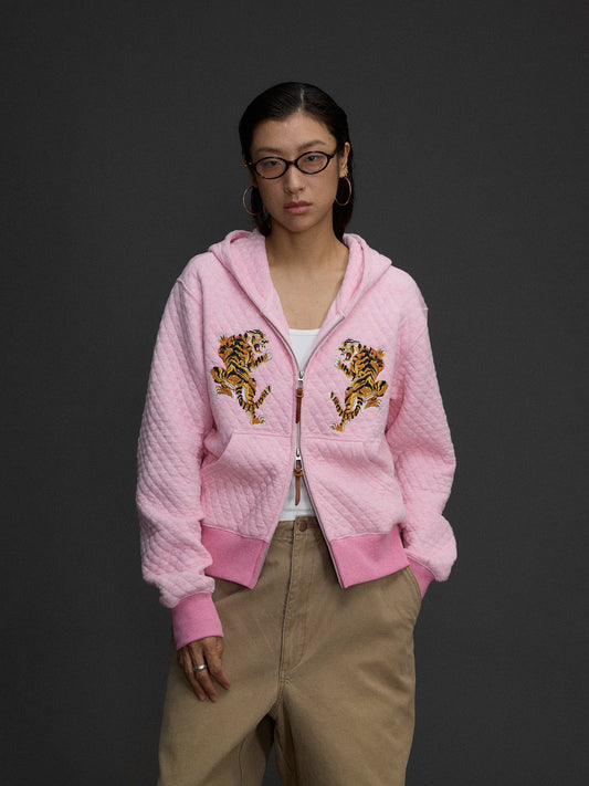 Chaqueta con capucha y cremallera bordada