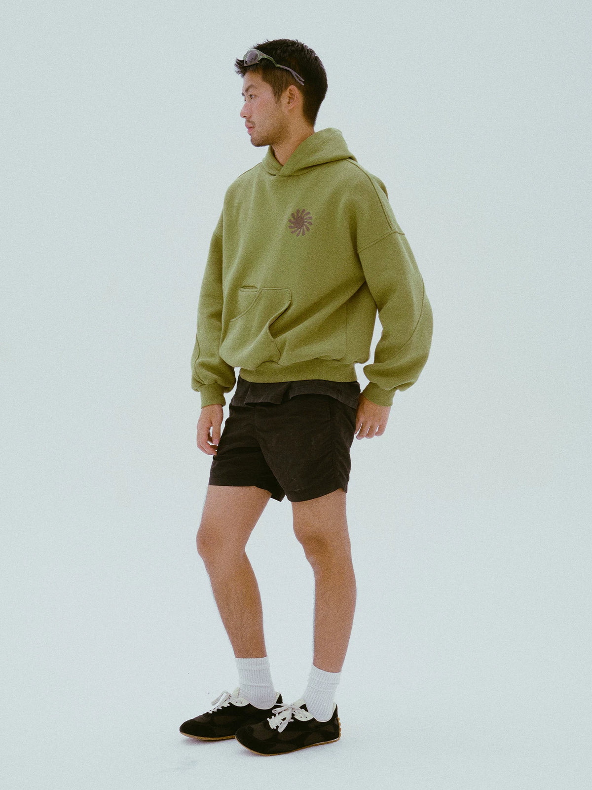Side view of the olive cotton hoodie