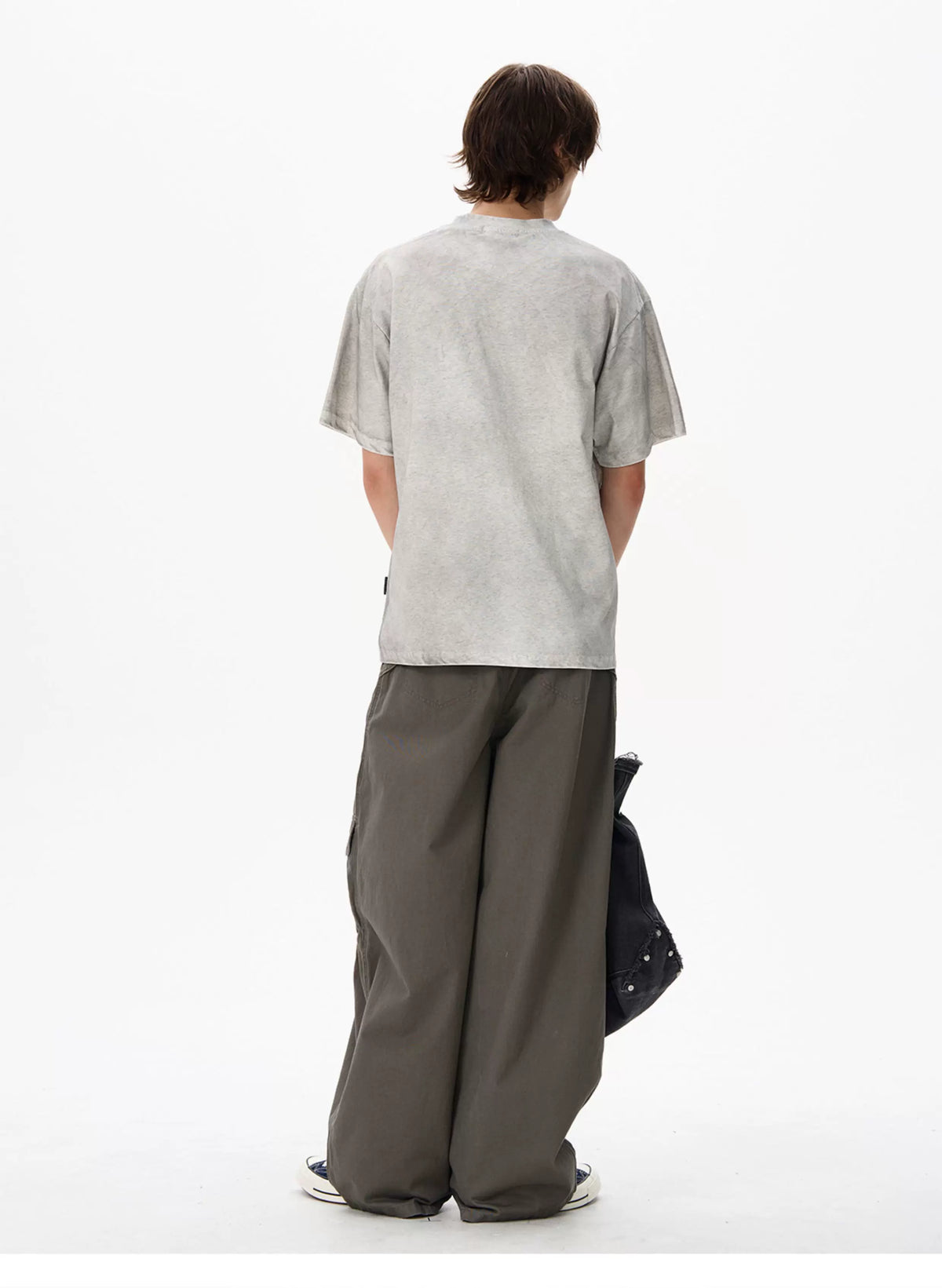 Heather gray vintage washed graphic T-shirt worn by a model - back view