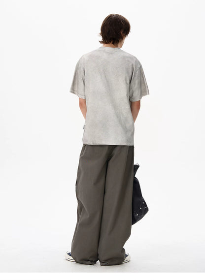 Heather gray vintage washed graphic T-shirt worn by a model - back view