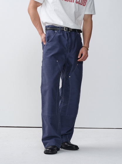 Model wearing blue cotton moleskin double-knee pants