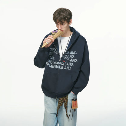 Black pullover hoodie with white printed text, worn on model, front view