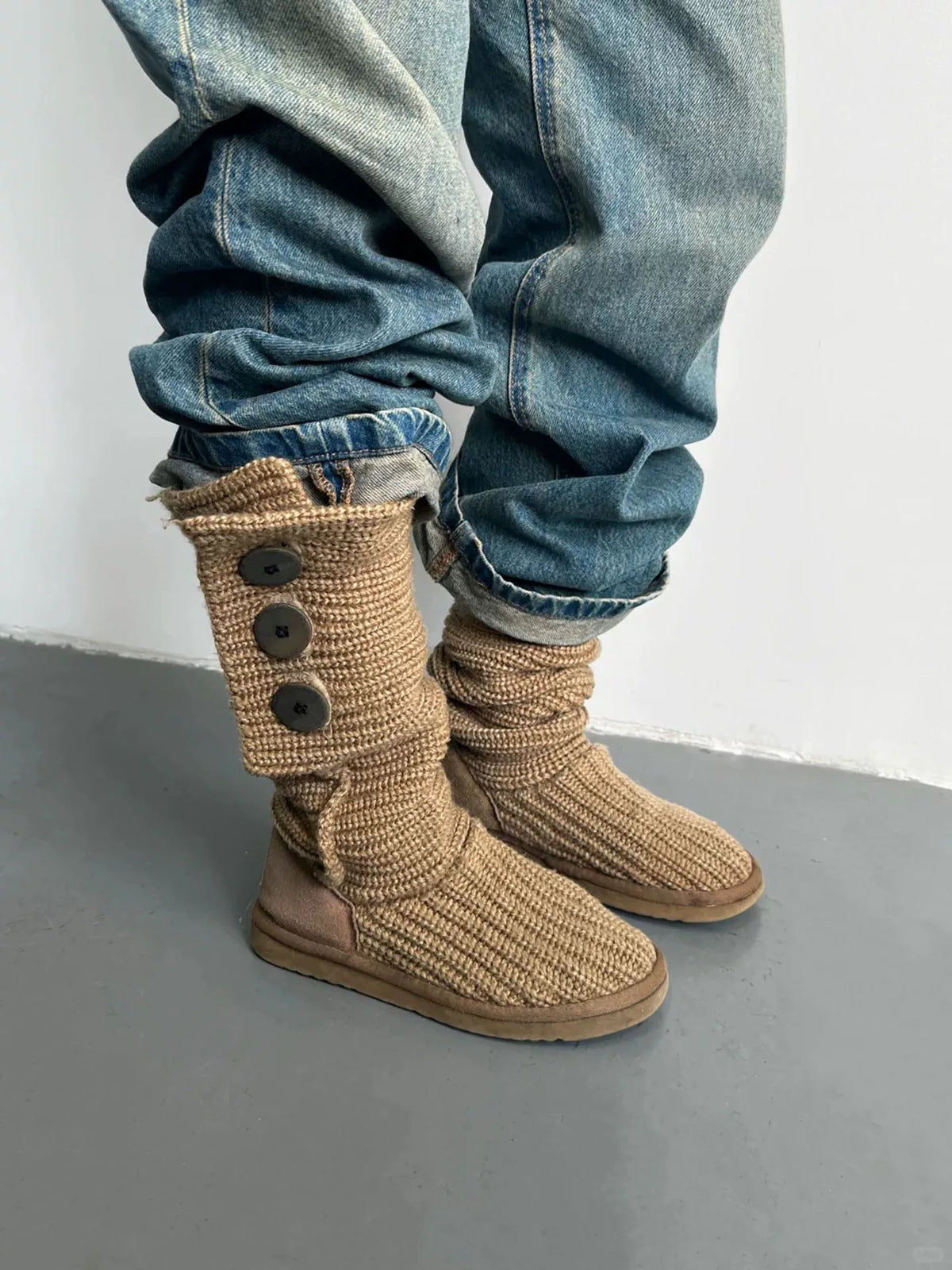Brown mid-calf knit boots, front view