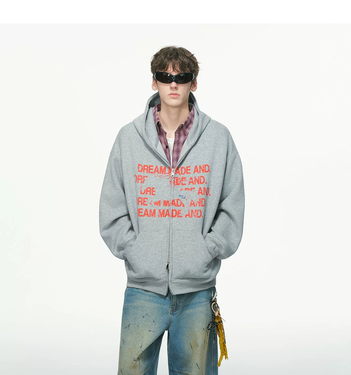 Black zip hoodie worn over white shirt, front view