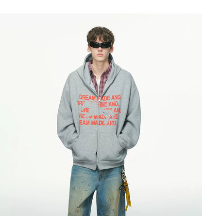 Black zip hoodie worn over white shirt, front view