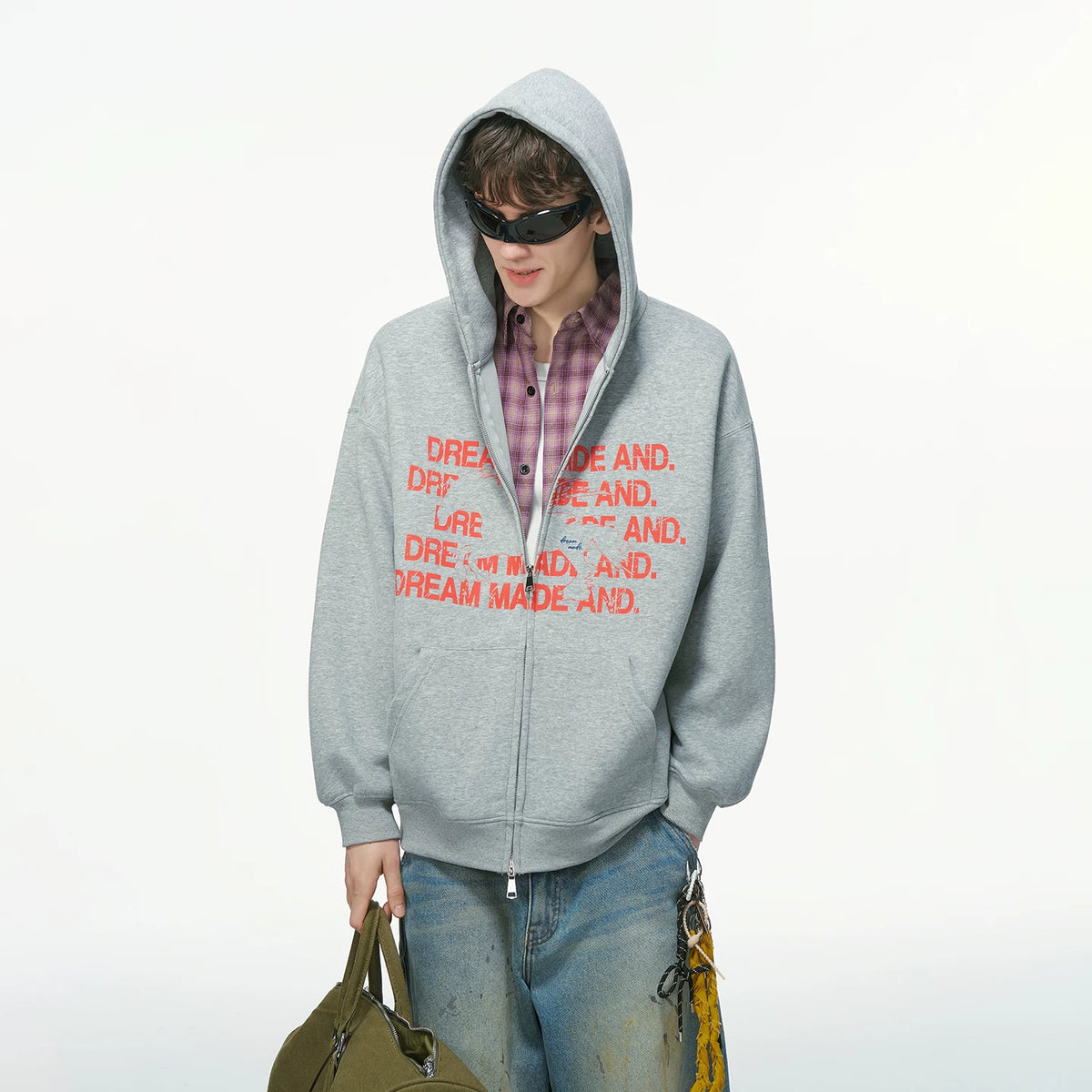 Light gray zip hoodie with red printed text, worn on model, front view