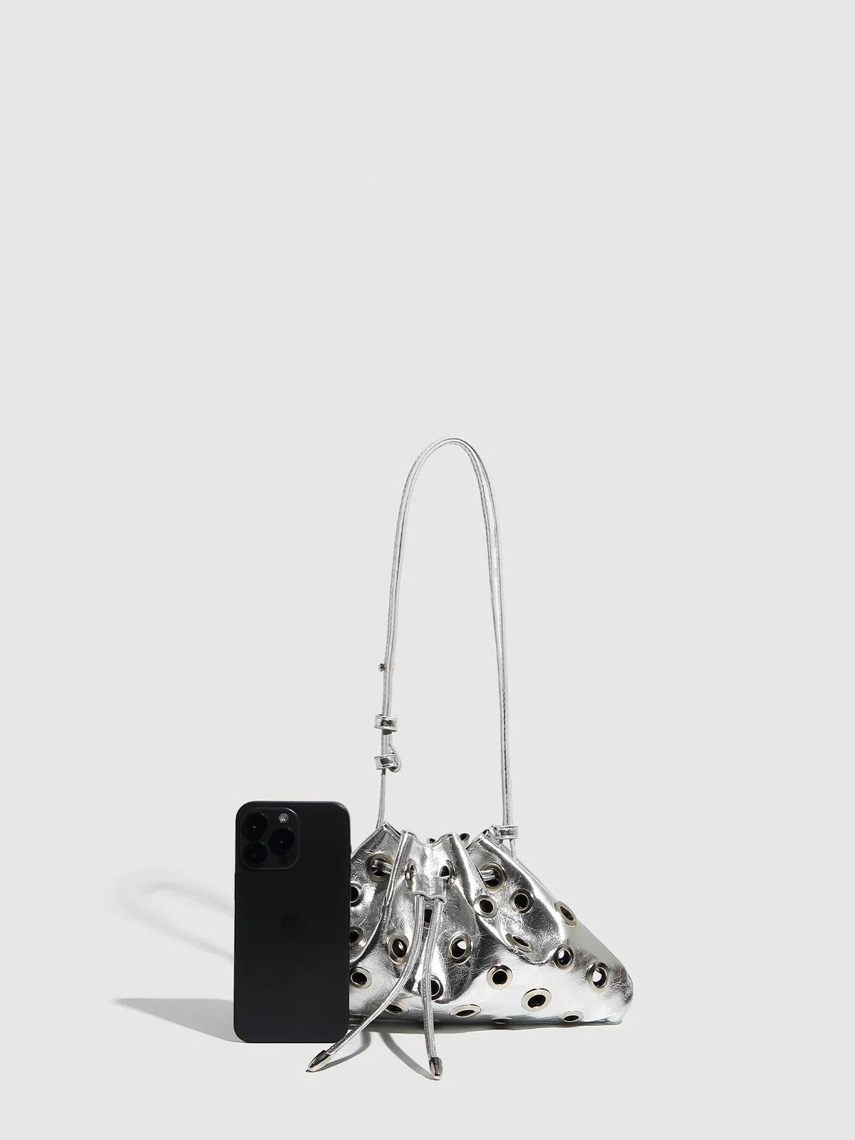 Eyelet Studded Drawstring Shoulder Bag product photo