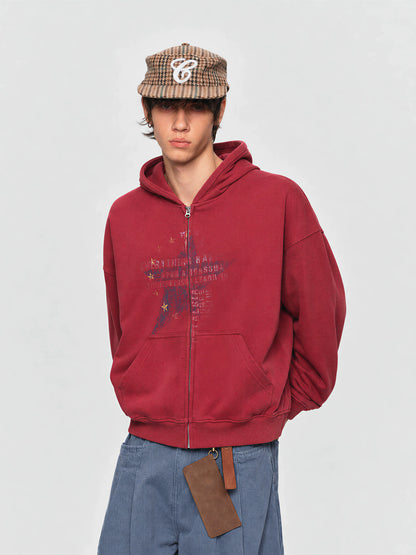 Model wearing the red star-print hoodie