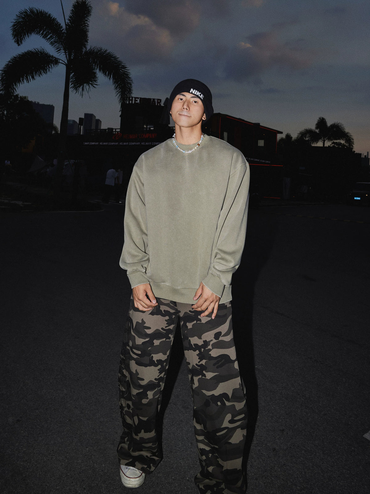 Sage green crewneck sweatshirt, full-length front view on model