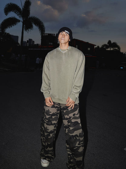 Sage green crewneck sweatshirt, full-length front view on model