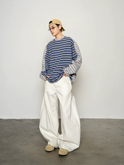 Blue and yellow striped long-sleeve T-shirt, full-length three-quarter view on model