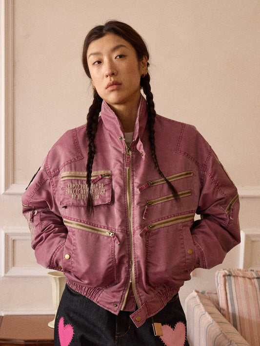 Chaqueta acolchada lavada con parches y bordado