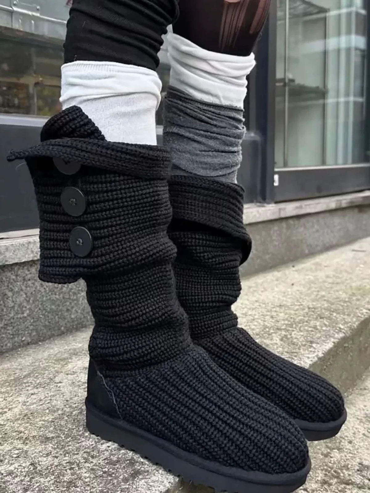 Black knit boots with button details