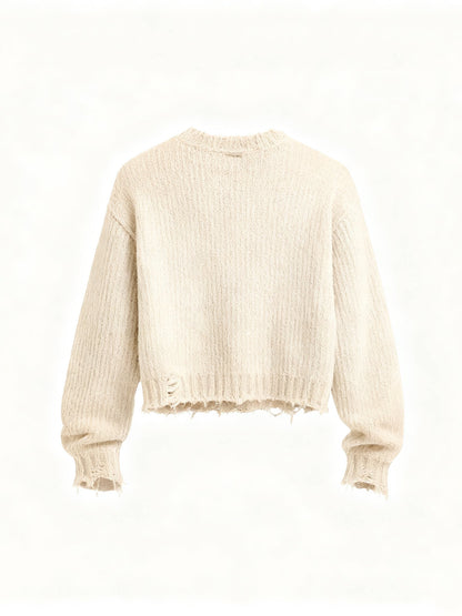 Back view of an off-white distressed knit sweater with a plain knit back