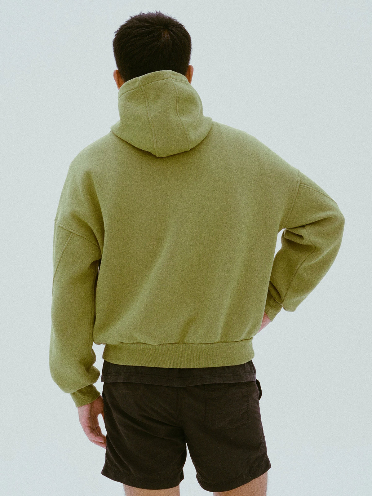 Back view of the olive sun-print hoodie