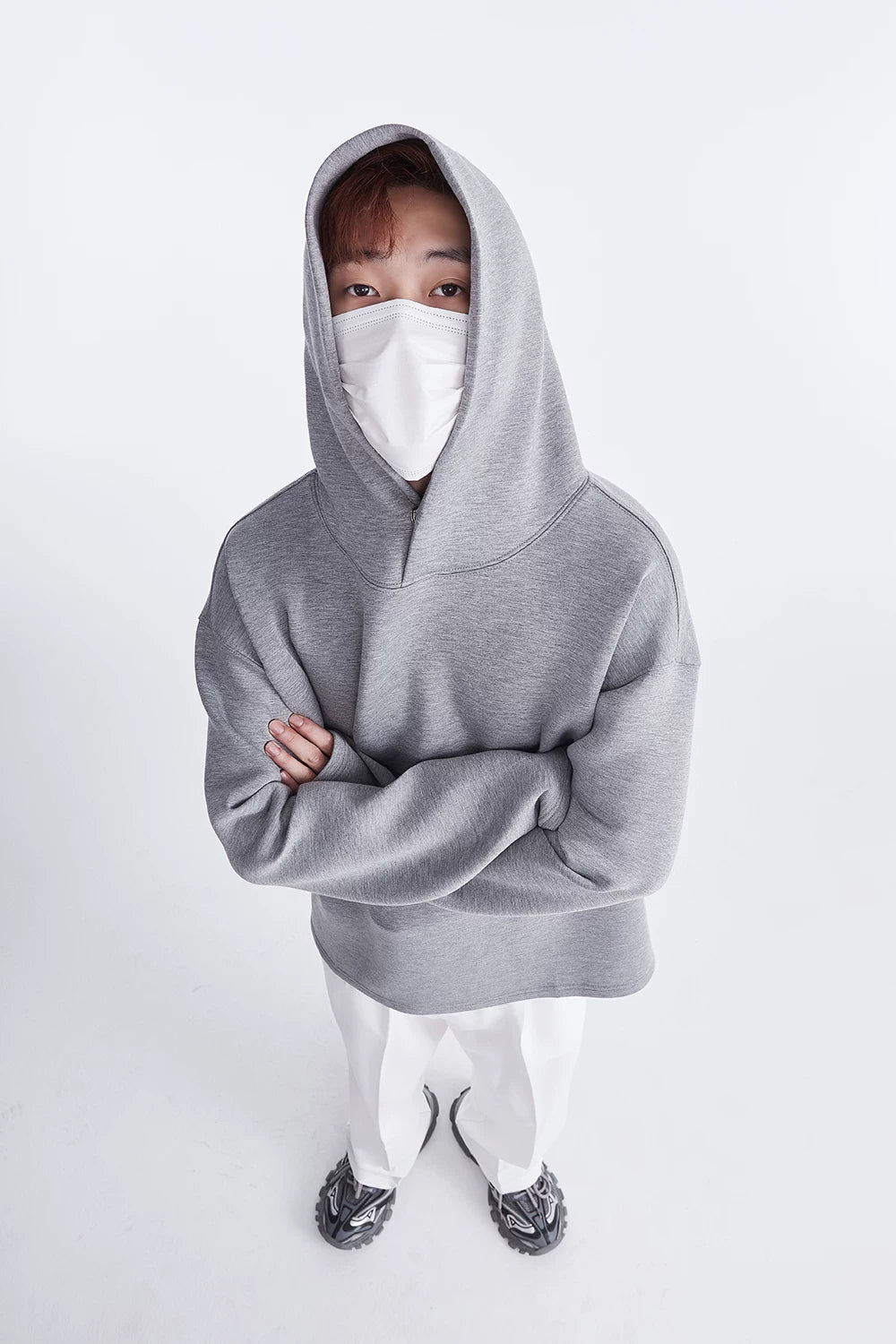 Grey hoodie, front view with arms crossed