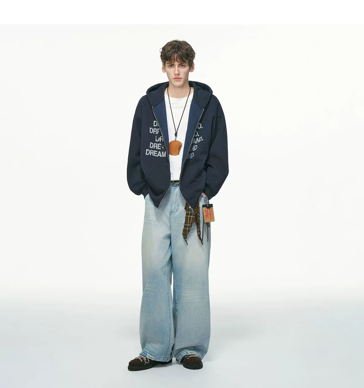 Black zip hoodie worn over white shirt, full body front view