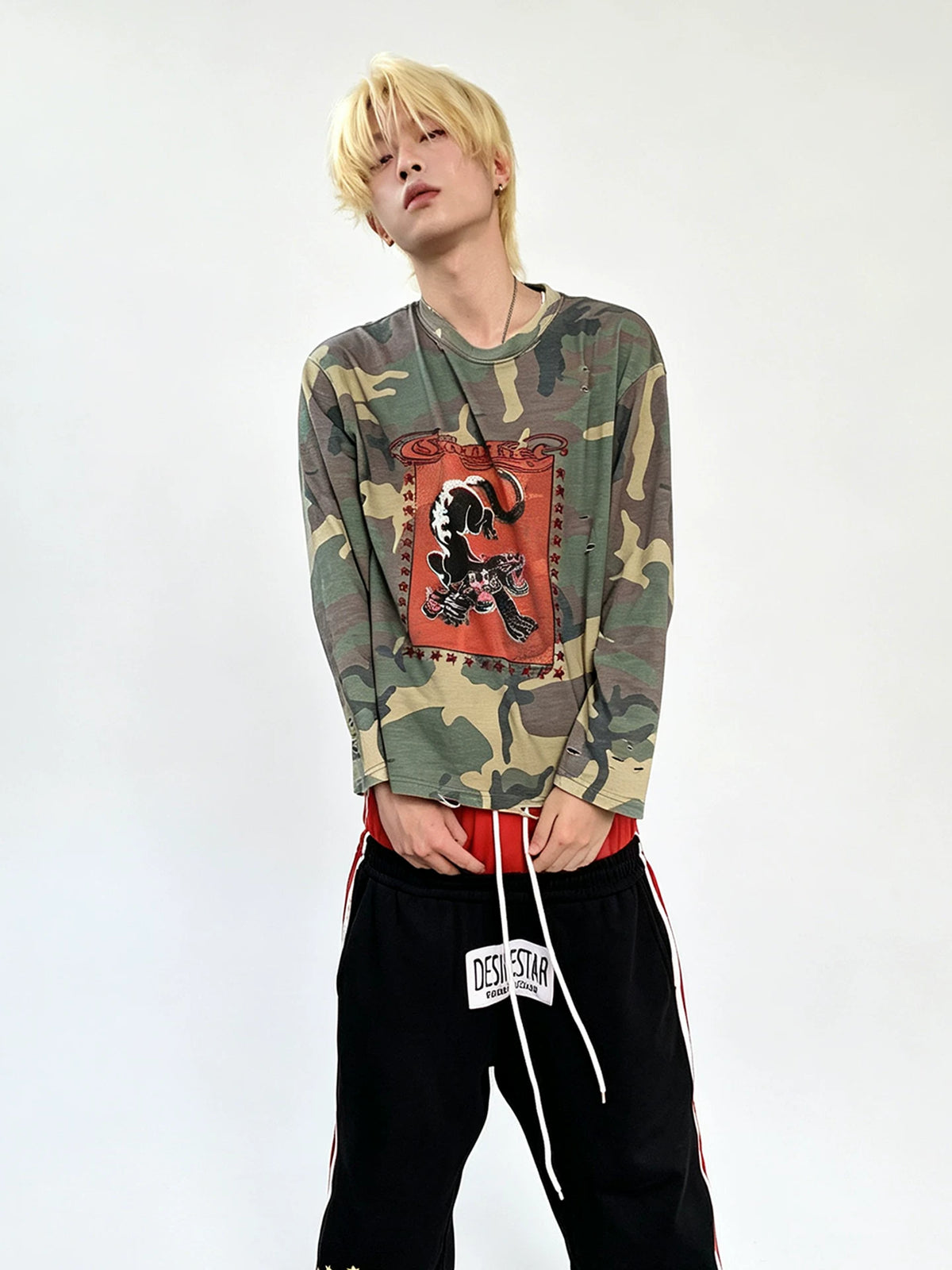 Model wearing the shirt with dark trousers